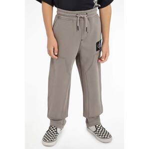 Dječji donji dio trenirke Calvin Klein Jeans boja: siva, glatki materijal