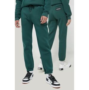 Donji dio trenirke Kangol unisex, boja: zelena, glatki materijal