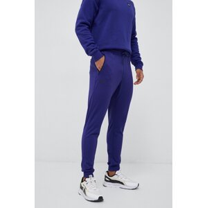 Donji dio trenirke Under Armour boja: zelena, glatki materijal