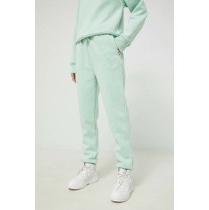 Donji dio trenirke Juicy Couture za žene, boja: zelena, s aplikacijom